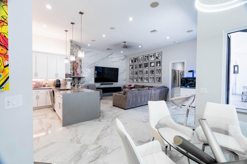 Welcome to this fully renovated lakefront home tucked away on a - photo 19
