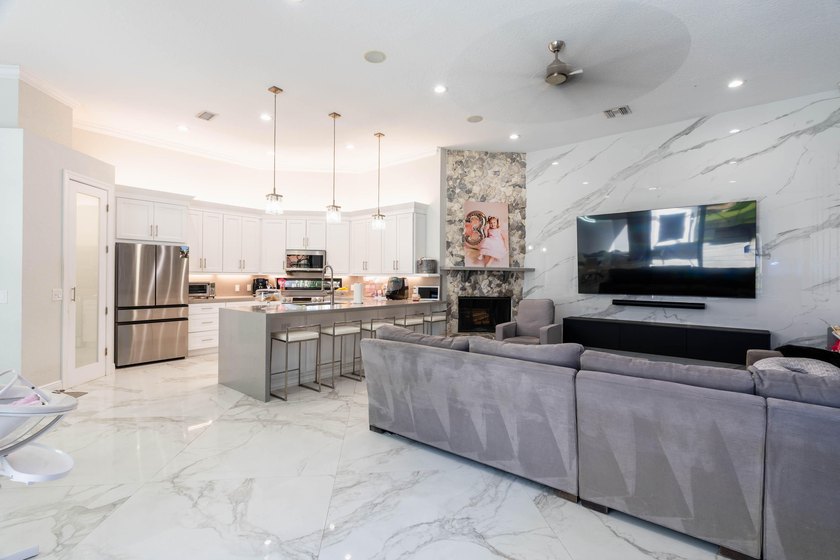 Welcome to this fully renovated lakefront home tucked away on a - photo 21