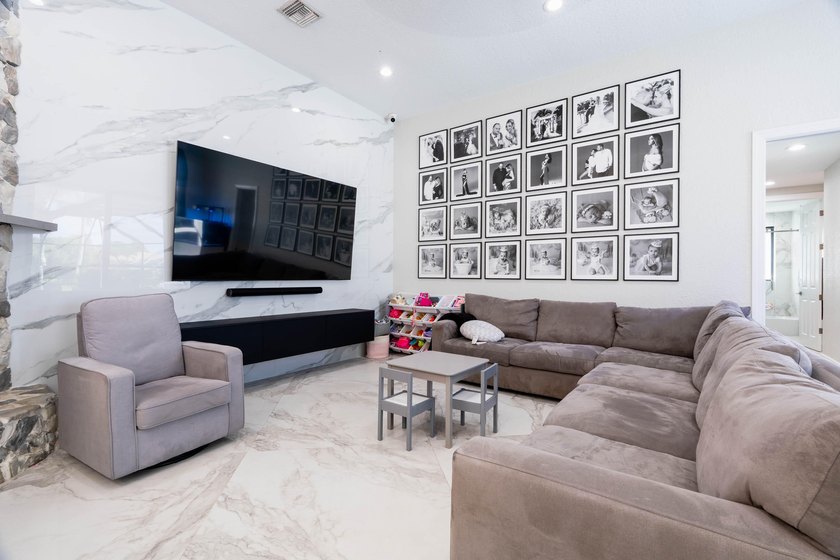 Welcome to this fully renovated lakefront home tucked away on a - photo 24
