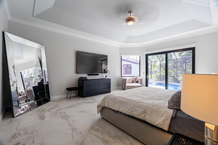 Welcome to this fully renovated lakefront home tucked away on a - photo 26