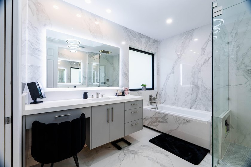 Welcome to this fully renovated lakefront home tucked away on a - photo 31