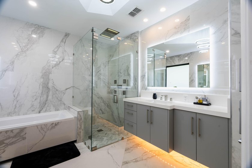 Welcome to this fully renovated lakefront home tucked away on a - photo 32