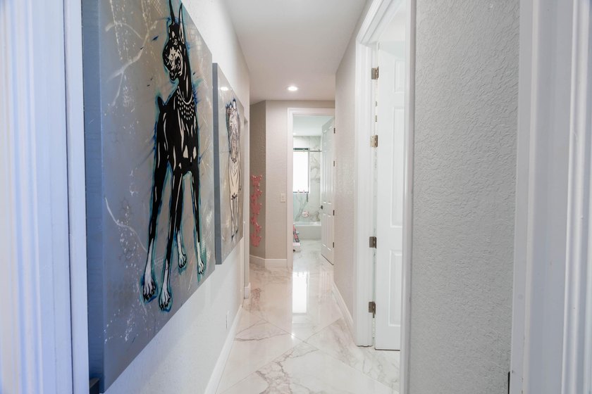 Welcome to this fully renovated lakefront home tucked away on a - photo 37