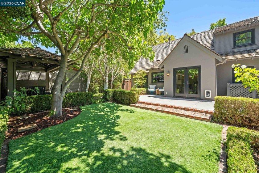 Behind the ivy-covered brick and shingled rooflines of this 1936 - photo 42