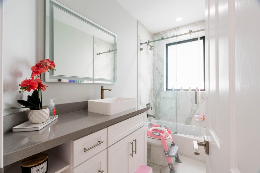 Welcome to this fully renovated lakefront home tucked away on a - photo 43