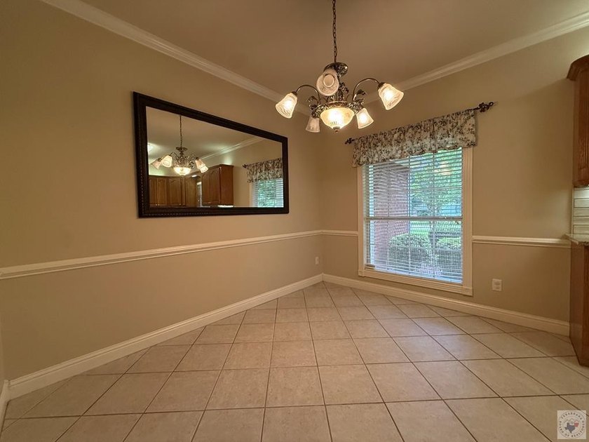 Beautiful Brick Home on 0.40 Acres in Maud, TX Welcome to this - photo 18