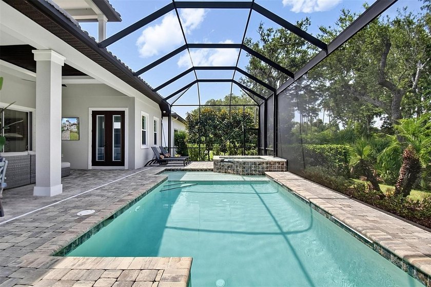 One-of-a-kind custom Gold Coast home, tucked within the private - photo 3