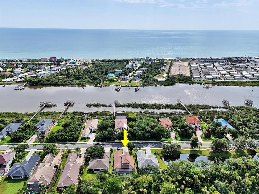 One-of-a-kind custom Gold Coast home, tucked within the private - photo 4