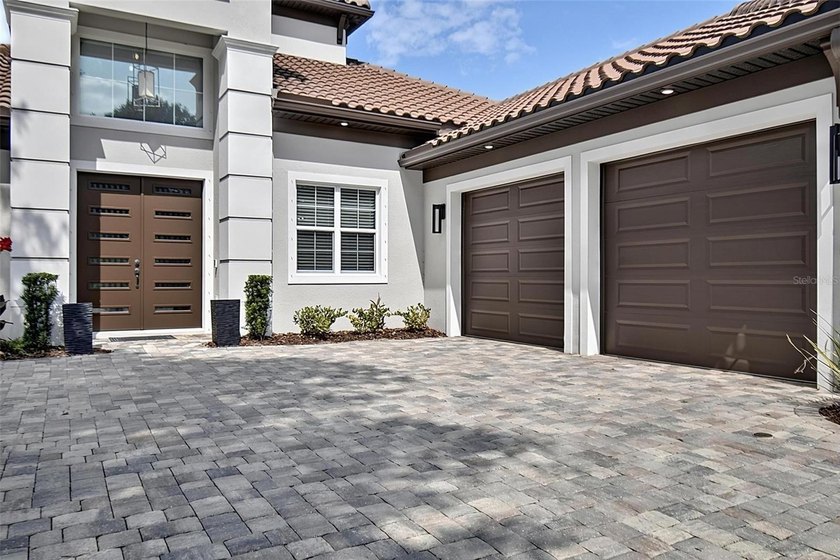 One-of-a-kind custom Gold Coast home, tucked within the private - photo 6