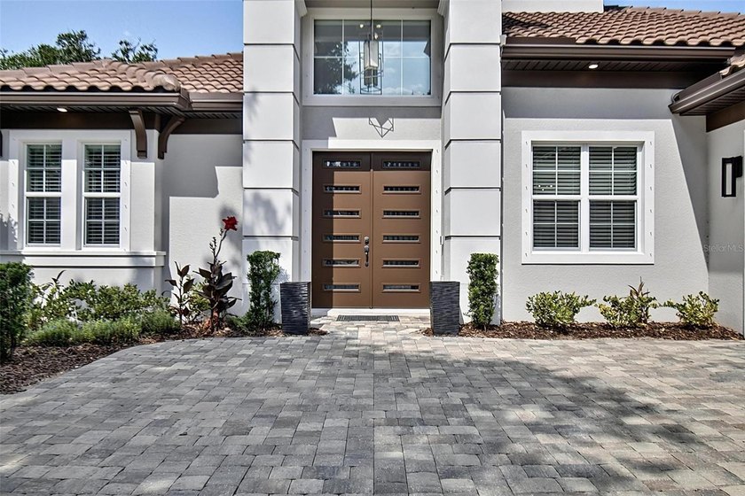 One-of-a-kind custom Gold Coast home, tucked within the private - photo 7