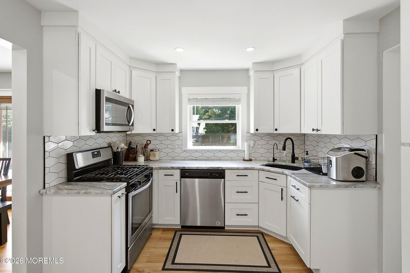 Welcome to this beautifully updated 3-bedroom 2 bath ranch in - photo 9