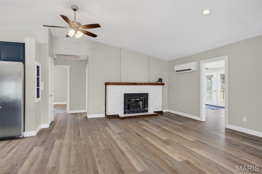 Vaulted ceilings, natural light, and quick lake access. This is - photo 6