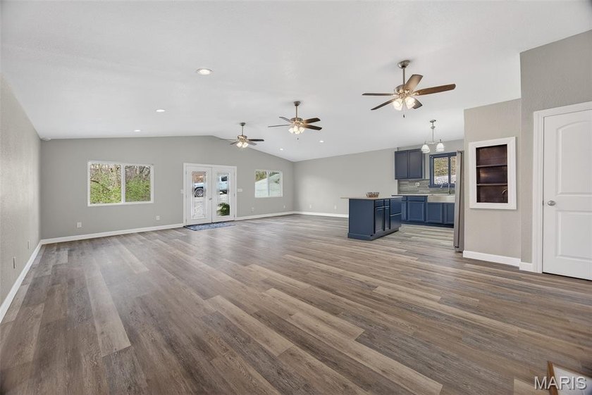 Vaulted ceilings, natural light, and quick lake access. This is - photo 8