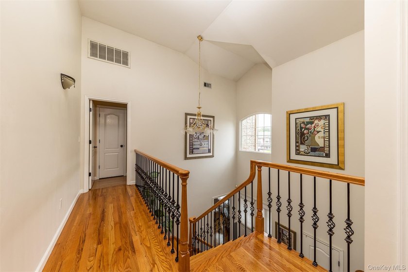 Custom-built Oceanside Colonial with 4 bedrooms, 2.5 baths and - photo 16