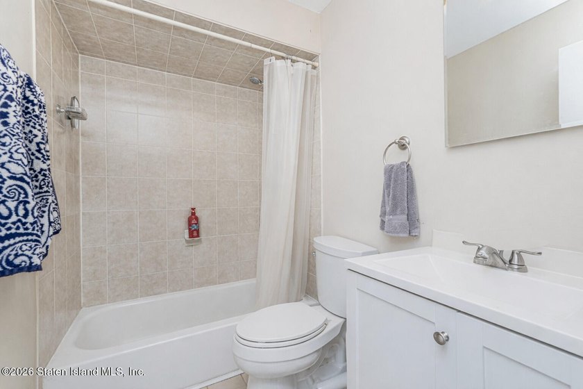 Discover 72 Reading Avenue-a two family Broadside Ranch tucked - photo 14