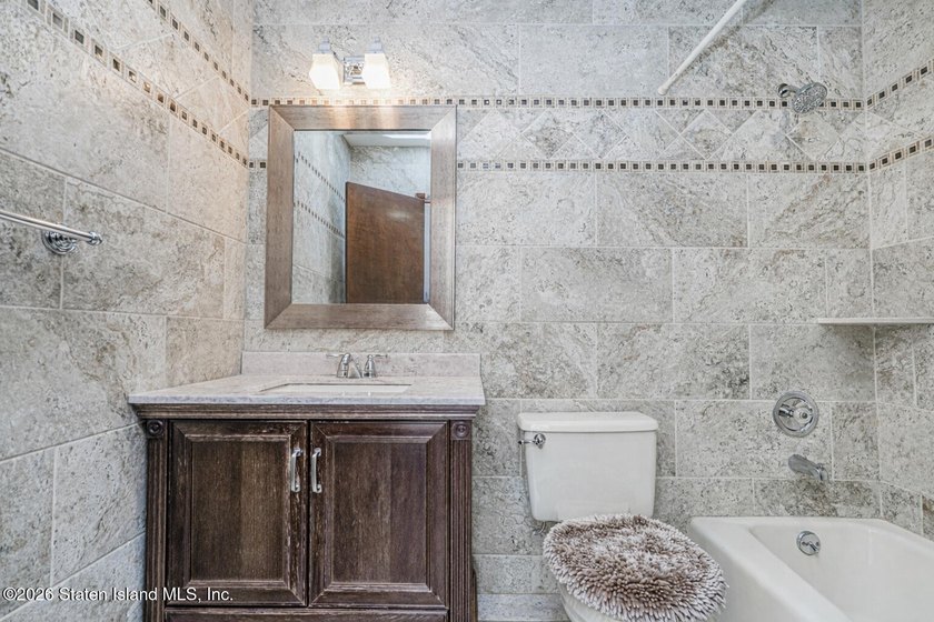 Discover 72 Reading Avenue-a two family Broadside Ranch tucked - photo 32