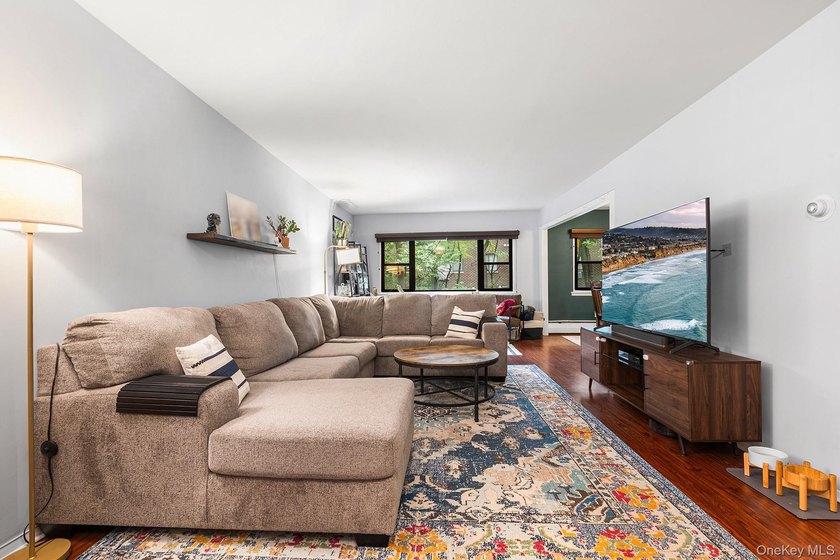 Spacious and versatile apartment featuring an extra-large living - photo 2