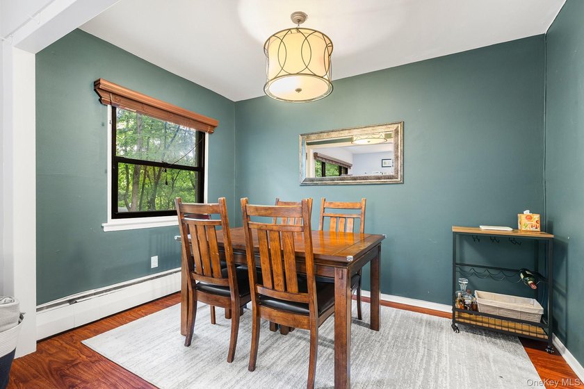 Spacious and versatile apartment featuring an extra-large living - photo 5