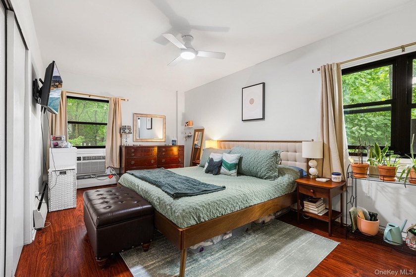 Spacious and versatile apartment featuring an extra-large living - photo 7
