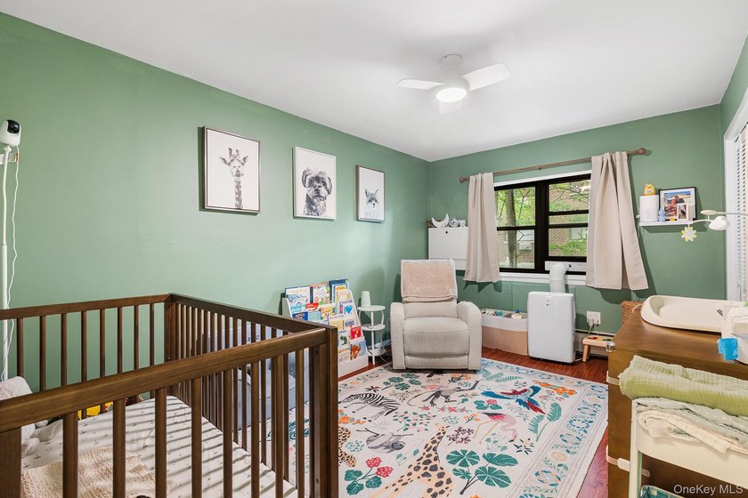 Spacious and versatile apartment featuring an extra-large living - photo 8