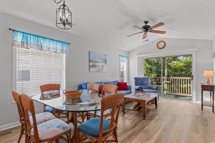 This move-in ready third-floor condo in the River Oaks community - photo 7