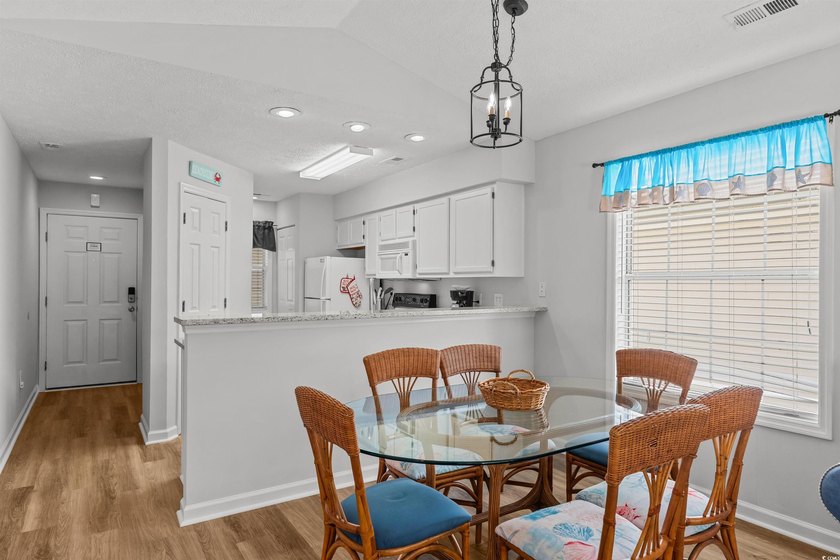 This move-in ready third-floor condo in the River Oaks community - photo 8