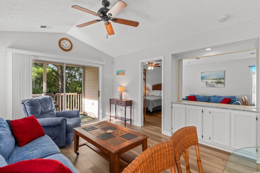 This move-in ready third-floor condo in the River Oaks community - photo 9