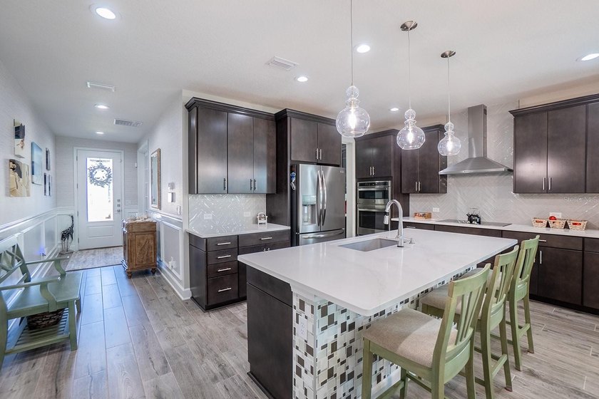 Move-in ready coastal retreat! Built in 2022, this 4BR/2BA home - photo 5