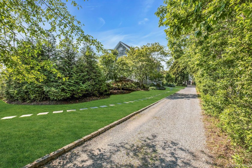 Minutes from Westhampton Beach Village, 56 South Country Road is - photo 5