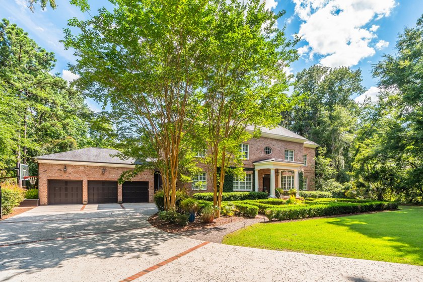 This is a rare opportunity to own the lovely brick two story - photo 3