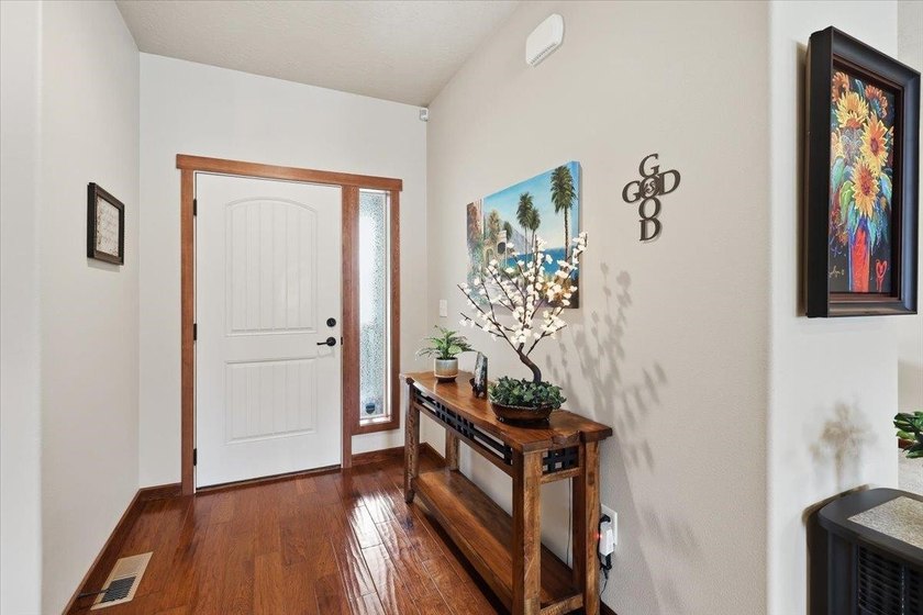 Impeccably maintained one-level home in the gated community of - photo 4