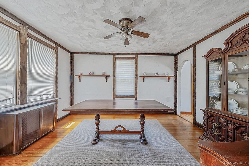 Welcome Home To This Charming Merrick Cape Cod Nestled Mid Block - photo 7
