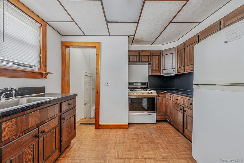 Welcome Home To This Charming Merrick Cape Cod Nestled Mid Block - photo 9