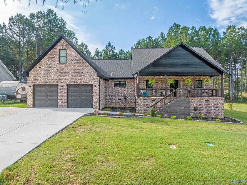 Stunning full brick home built in 2021 with 4 beds, 3 baths and - photo 2