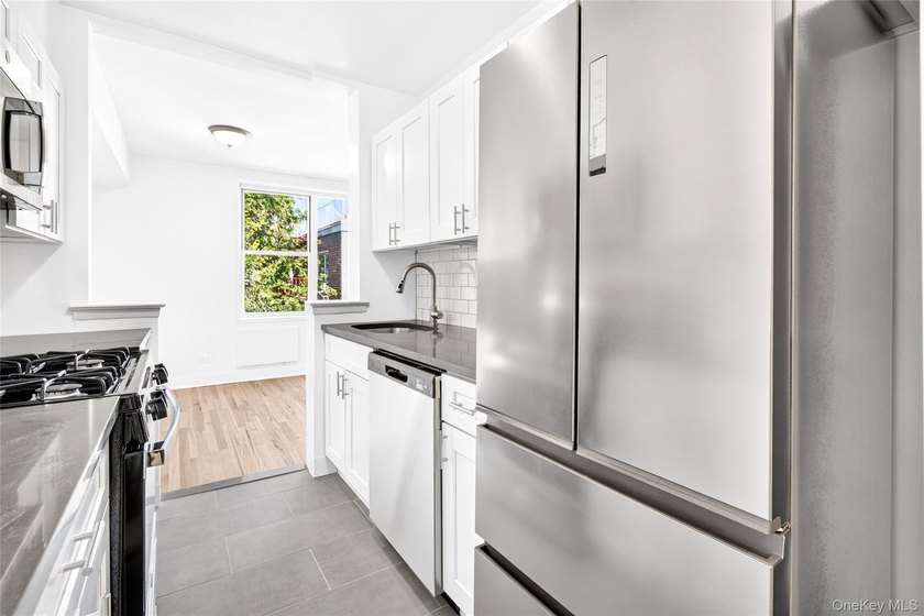 *SPONSOR SALE* NO BOARD APPROVAL! Welcome to the fully renovated - photo 7