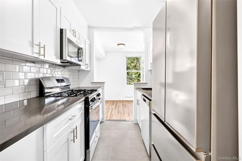 *SPONSOR SALE* NO BOARD APPROVAL! Welcome to the fully renovated - photo 10