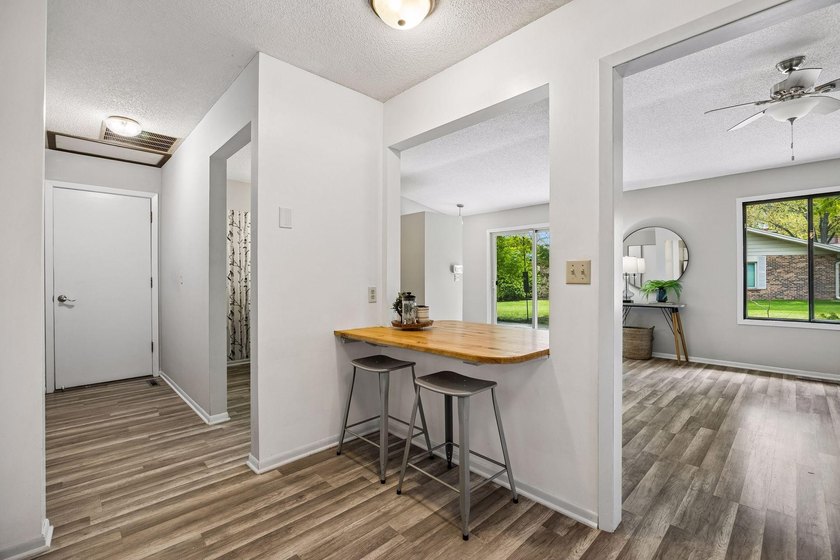 Welcome to this inviting end-unit townhome in the desirable - photo 15