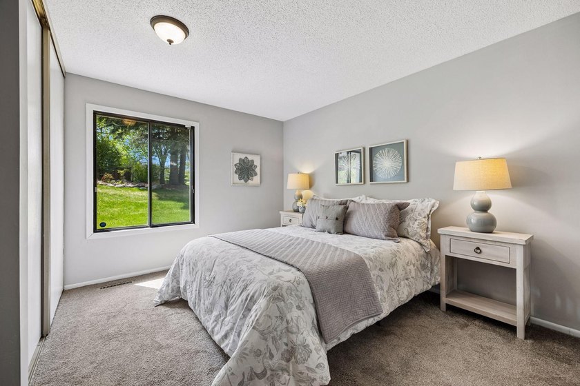 Welcome to this inviting end-unit townhome in the desirable - photo 17