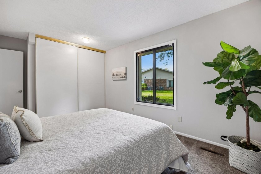 Welcome to this inviting end-unit townhome in the desirable - photo 24