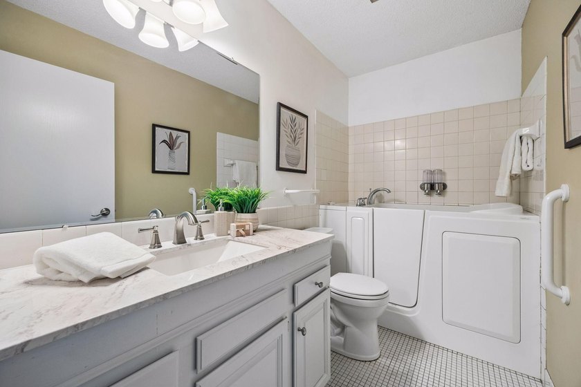 Welcome to this inviting end-unit townhome in the desirable - photo 25