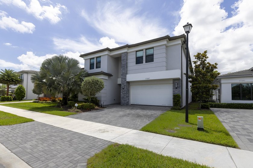 5BD | 7BA | 4,484 SF | Built 2021 | Gated Community Masterfully - photo 2