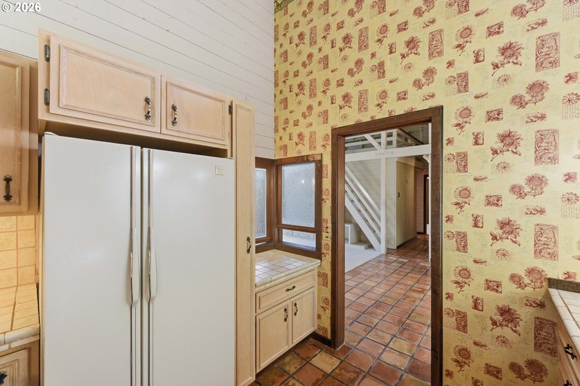 Custom townhouse tucked away on 3+ private, in-town acres - photo 11