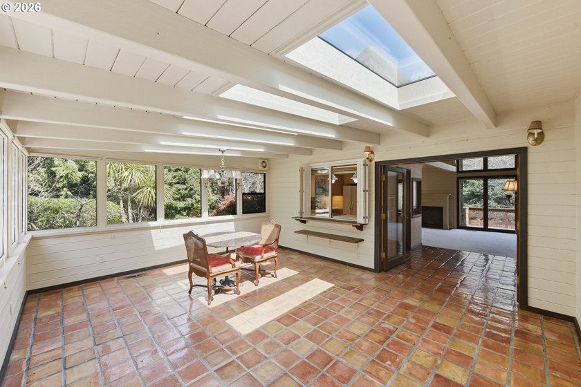 Custom townhouse tucked away on 3+ private, in-town acres - photo 13