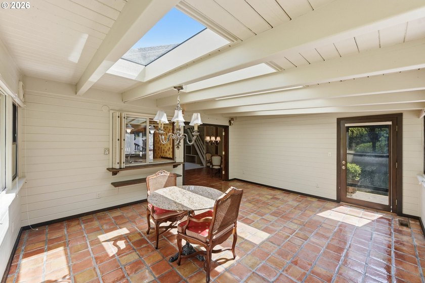 Custom townhouse tucked away on 3+ private, in-town acres - photo 15