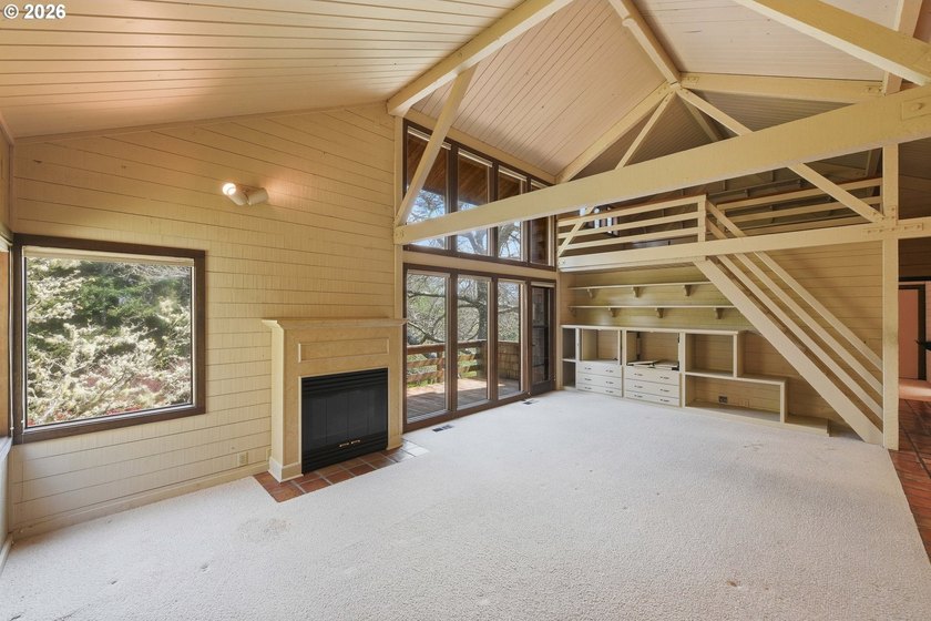 Custom townhouse tucked away on 3+ private, in-town acres - photo 17