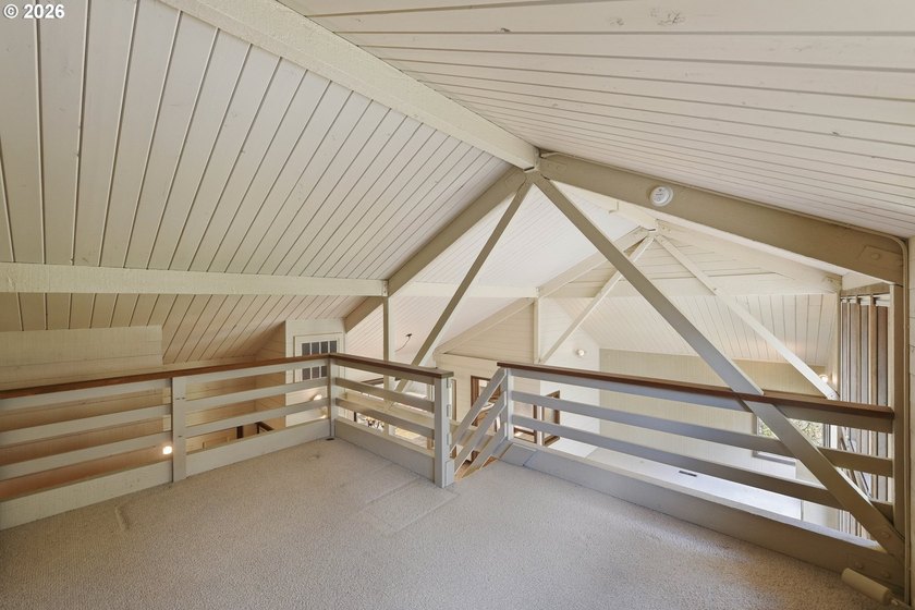 Custom townhouse tucked away on 3+ private, in-town acres - photo 21