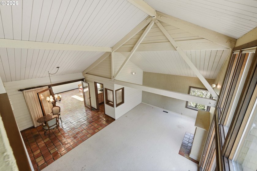 Custom townhouse tucked away on 3+ private, in-town acres - photo 22