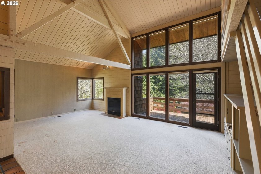 Custom townhouse tucked away on 3+ private, in-town acres - photo 23