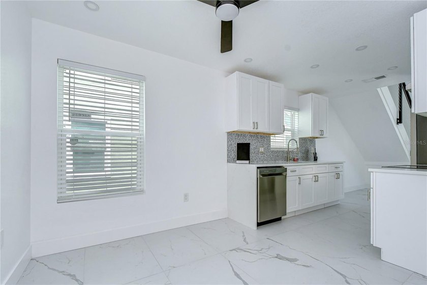 Step into this gorgeous, stylish, modern NEW construction home - photo 8