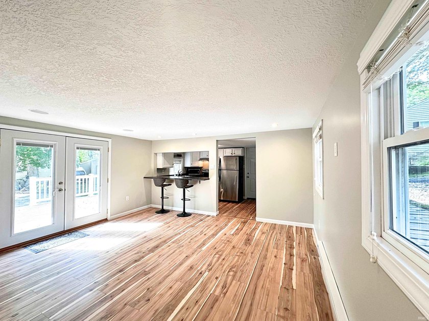 NO PROJECTS NEEDED! FULL RENO! This Irish Lake cottage is - photo 7